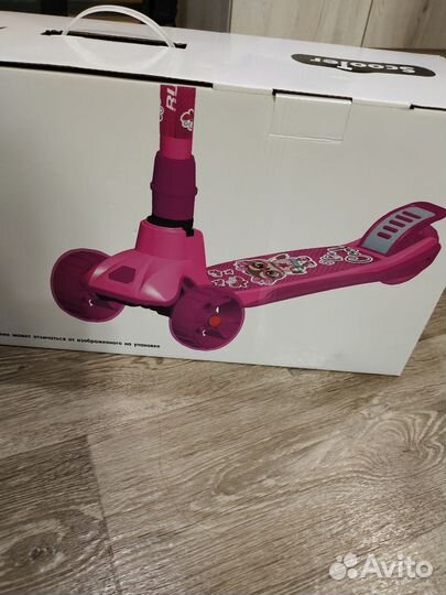 Самокат трёх колесный