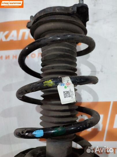 Стойка амортизатора передняя правая Kia Sportage 4