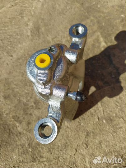 Суппорт тормозной задний левый Ниссан Х-трейлТ-31