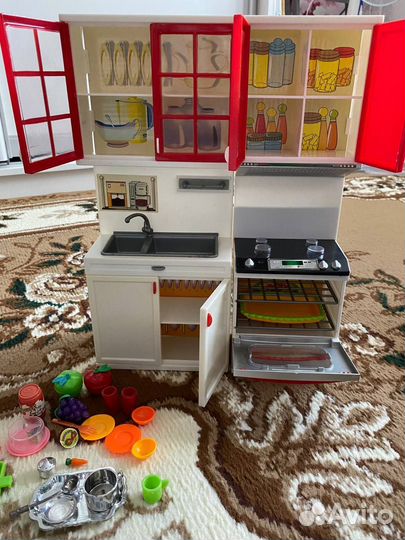 Детская игрушка кухня