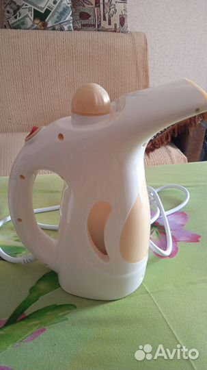 Ручной пароочиститель для одежды