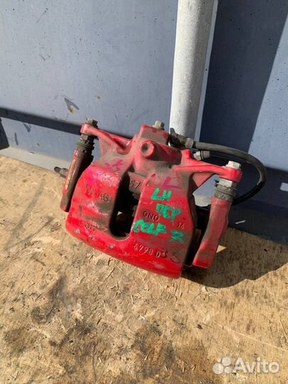 Суппорт тормозной передний левый Volkswagen Golf 7