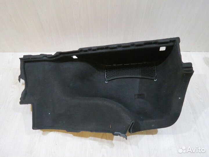 Обшивка багажника левая Kia Quoris