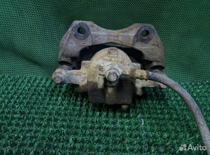 Суппорт передний левый Nissan Almera N16 N16