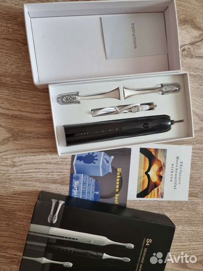 Электрическая зубная щетка