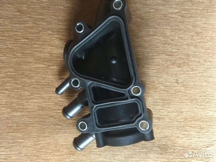 Корпус термостата на Форд фокус 1 1.6л