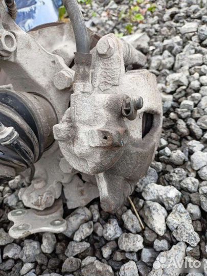 Суппорт тормозной передний левый Opel Corsa D