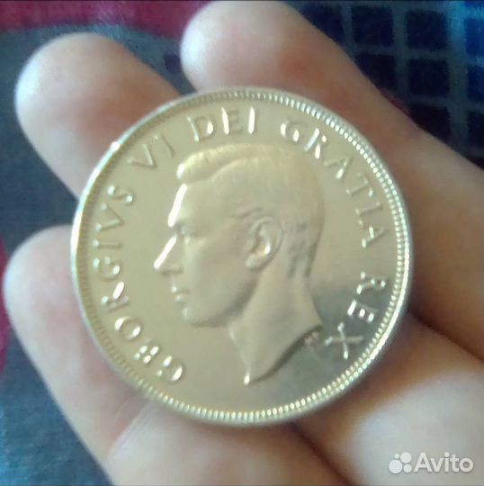 Канада. Георг 6. Индейцы в пироге. Серебро 800* VF