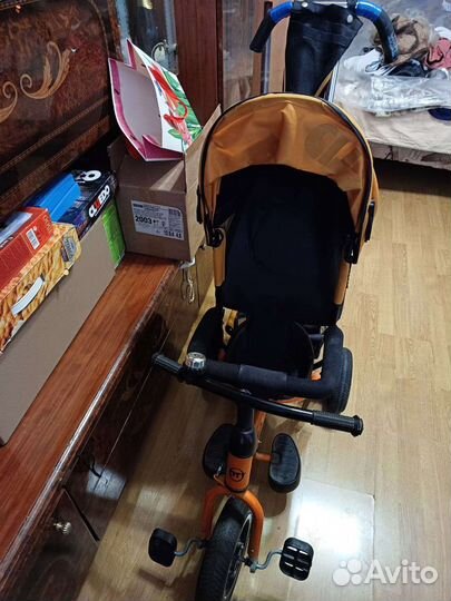 Детский велосипед с ручкой