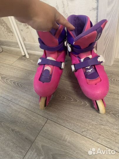 Роликовые коньки