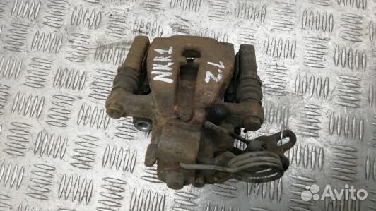 Суппорт тормозной задний левый ford kuga 1 (NKR01M