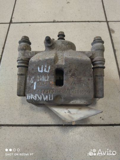 Суппорт тормозной передний правый Kia Picanto 1