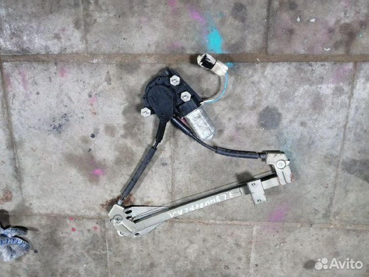 Стеклоподъемник задний левый Лада Калина