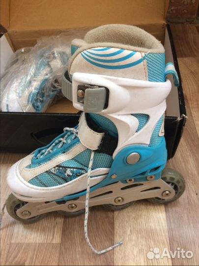 Роликовые коньки