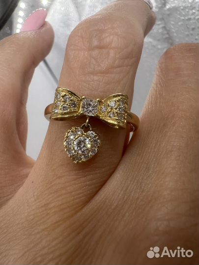 Золотое кольцо бант с бриллиантами 750 проба