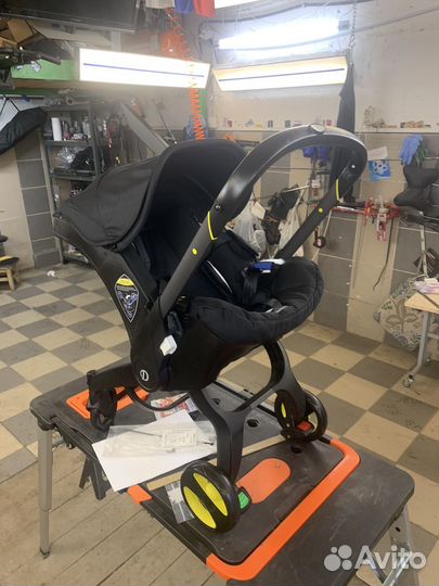 Автолюлька на колесах для новорожденных