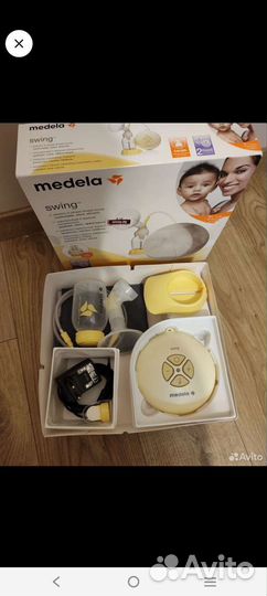 Молокоотсос medela swing электрический
