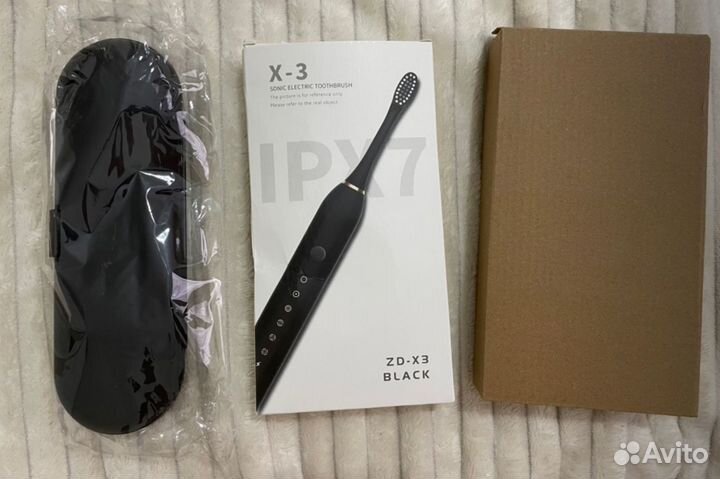 Электрическая зубная щетка новая