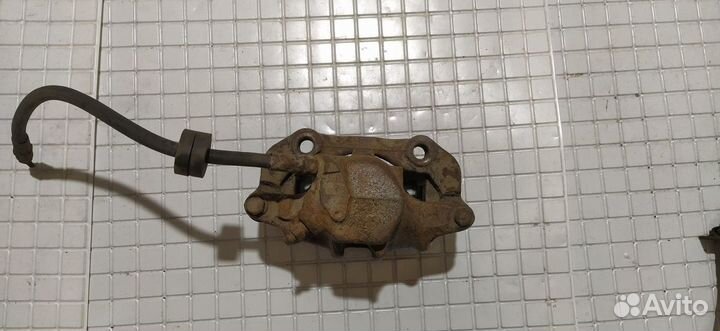 Суппорт тормозной передний левый Audi 80