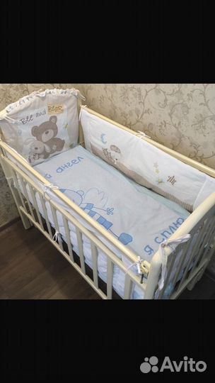 Детская кроватка с продольным маятником