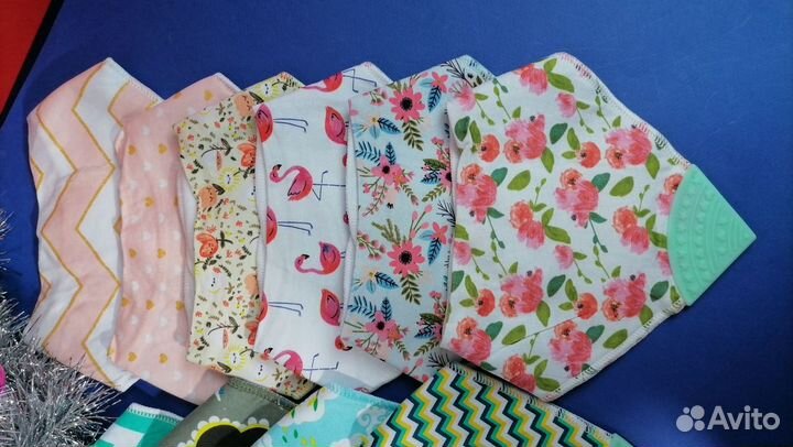 Слюнявчики с прорезывателем, новые