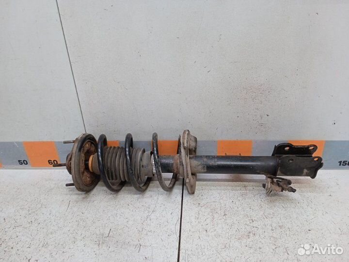 Амортизатор передний левый Mazda Tribute 3.0 2003