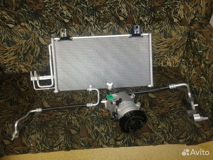 Радиатор кондиционера KIA spectra