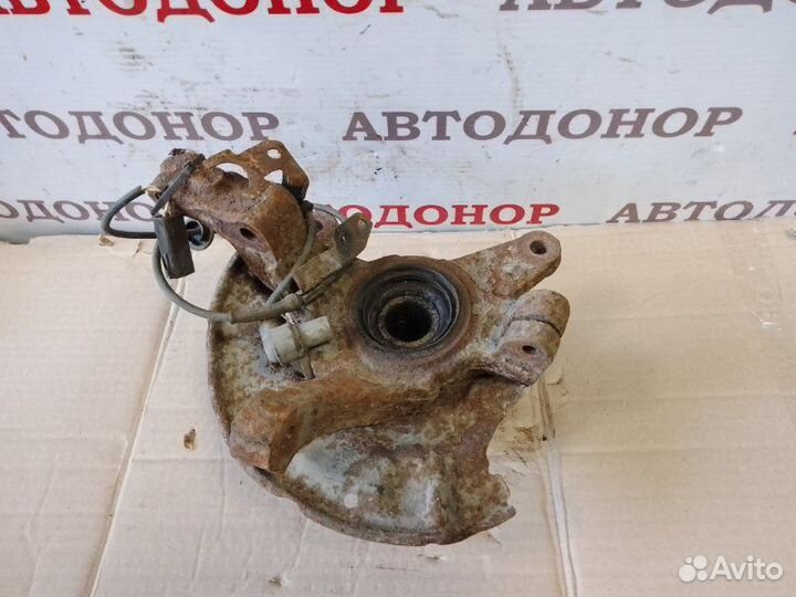 Поворотный кулак передний левый Mazda 626 GE