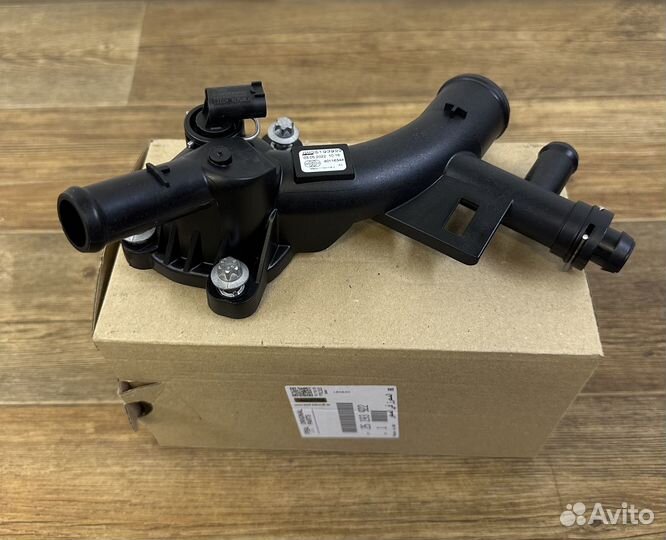 Распределитель системы охлаждения Опель 1,4 турбо