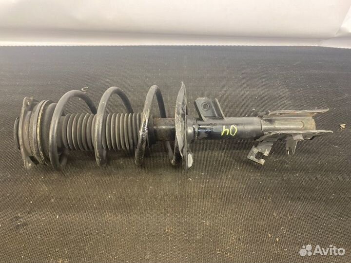 Амортизатор передний левый Nissan X-Trail T31