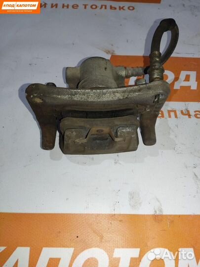 Суппорт тормозной задний левый Mitsubishi Lancer