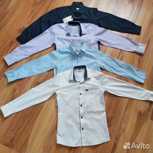 Рубашки на мальчика 128-134