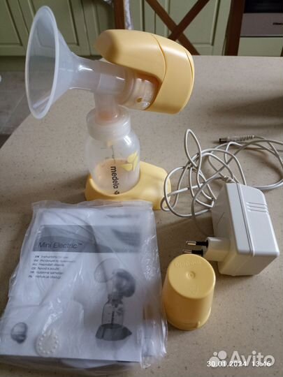 Молокоотсос medela электрический
