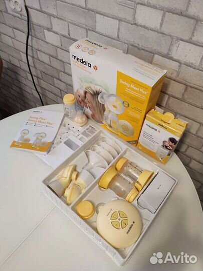 Молокоотсос medela swing maxi flex