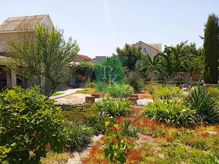 Дом 165 м² на участке 12 сот.