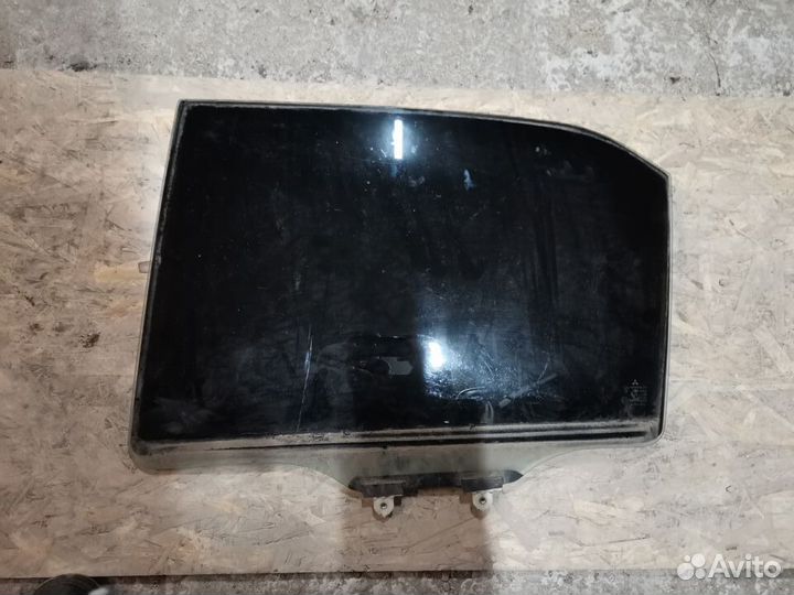 Стекло задней левой двери Lancer 9