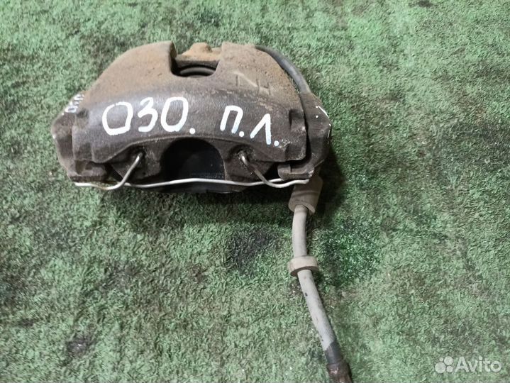 Суппорт тормозной передний левый Ford Focus II (20