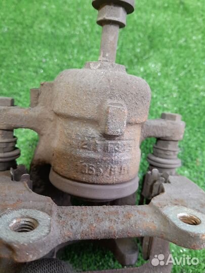 Суппорт задний левый бмв е90