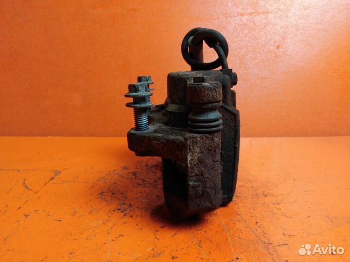 Суппорт тормозной передний левый Ford Explorer