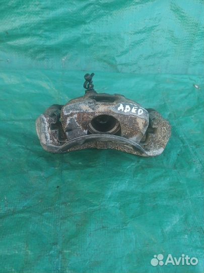 Суппорт передний правый Chevrolet Aveo 2003-2008