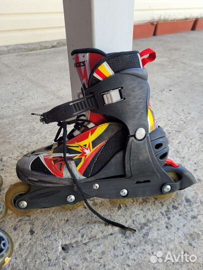 Роликовые коньки