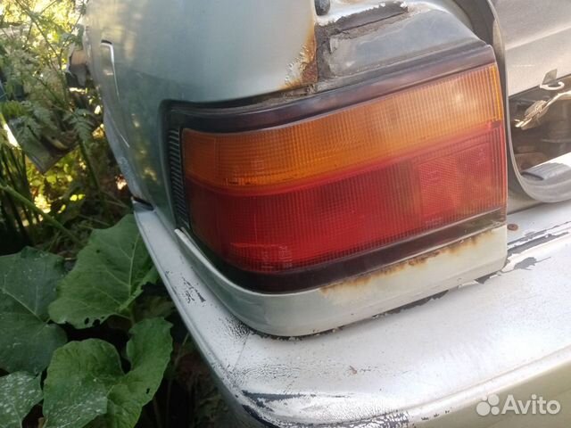 Фонарь задний наружный Honda Concerto