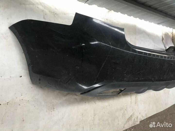 Бампер задний Kia Rio 2 2006-2011