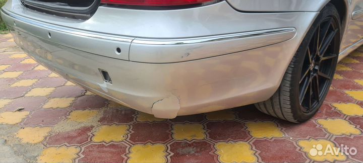 Задний бампер w211