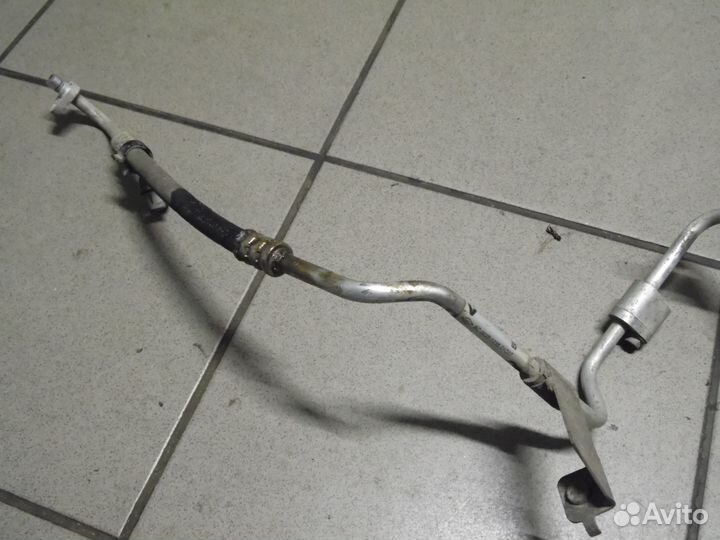 Трубка кондиционера Рено Логан 2