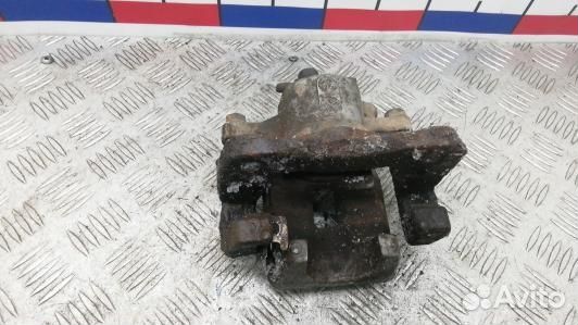 Суппорт тормозной задний левый toyota RAV 4 ZSA3