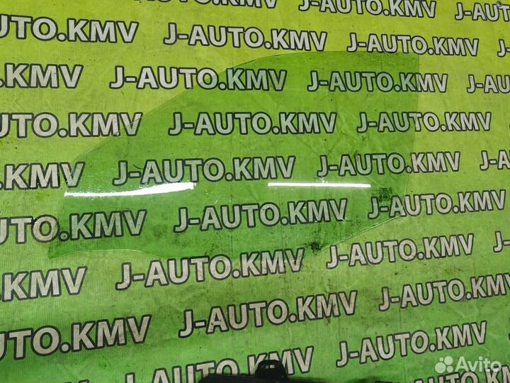 Стекло двери Nissan Sunny