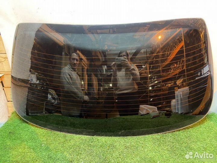 Стекло заднее Kia Spectra