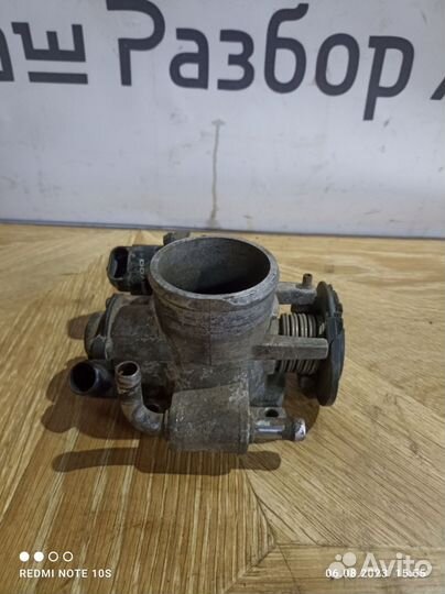 Дроссельная заслонка Chevrolet Aveo 1.4
