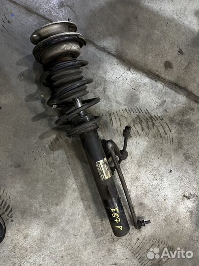 Стойка передняя левая BMW 1 (E87)